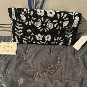 Sol and Mer black and white beaded clutch with silver hardware for Crossbody